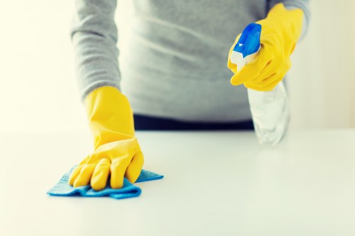 Discussing a cleaning complaint and possible resolution steps